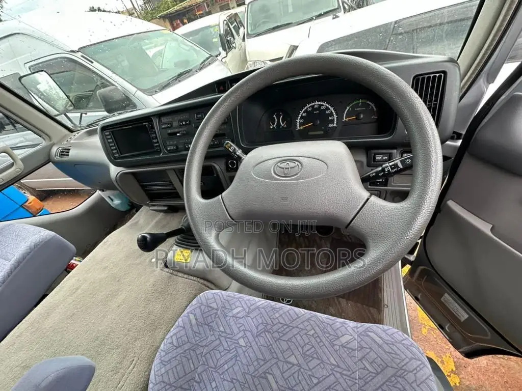 Toyota Coaster 2013 Silver
