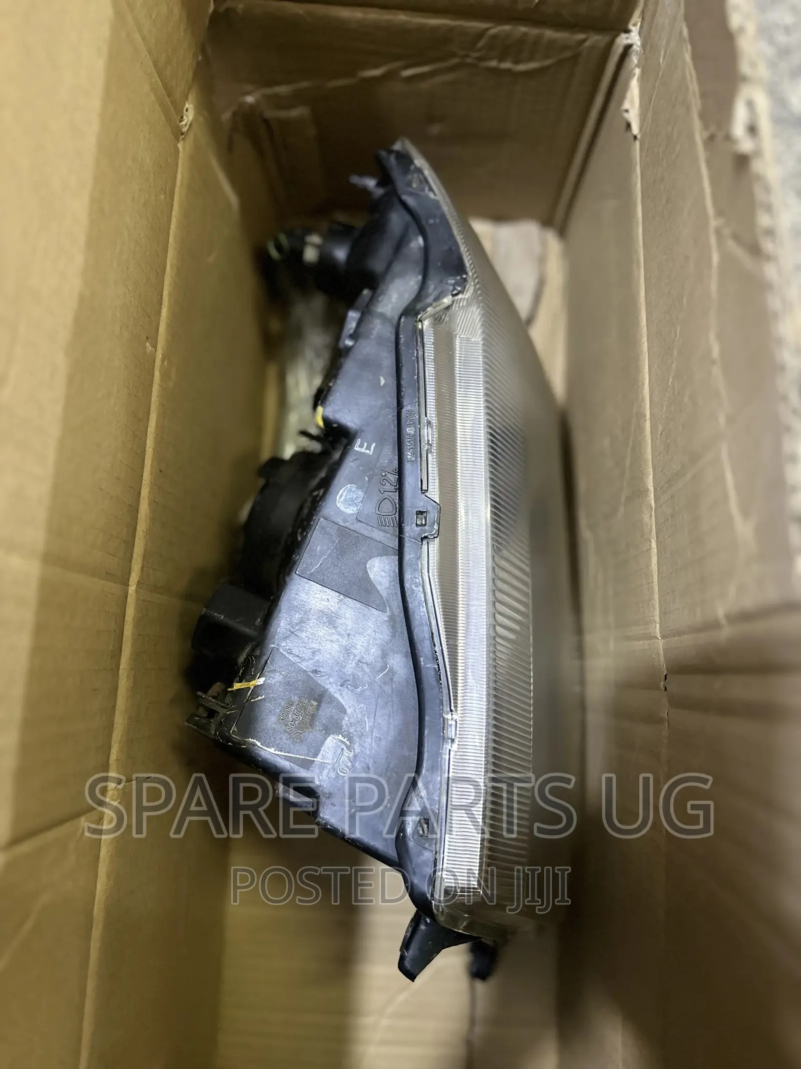 Mitsubishi Pajero IO Headlight