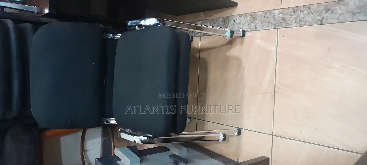 An Stackable Chair With Stainless Steel Legs