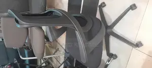 A Durable Netted Office Chair Without Headrest