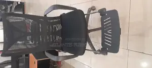 Office Ergonomic Chair With a Leg Rest and Back Reclining