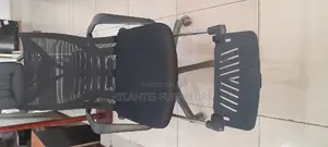 Office Ergonomic Chair With a Leg Rest and Back Reclining