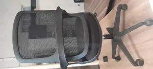 An Extraordinary Netted Office Chair With Arms