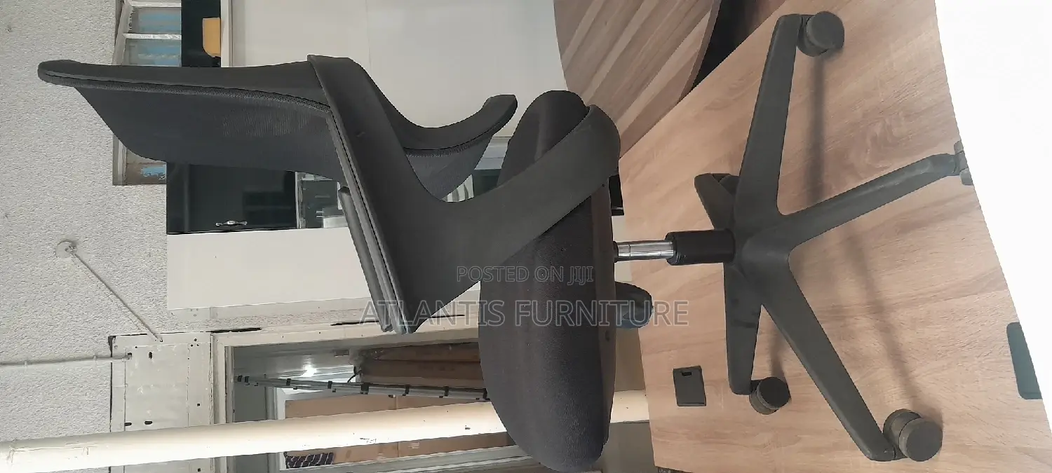 An Extraordinary Netted Office Chair With Arms