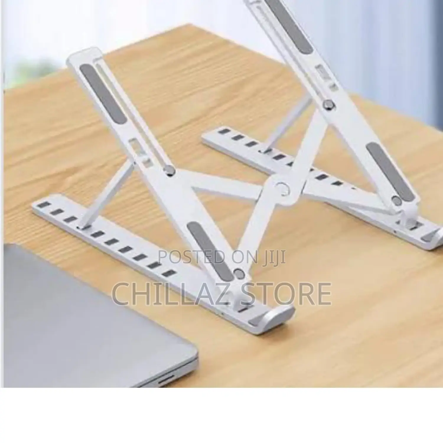 Foldable Confident Laptop Stand.
