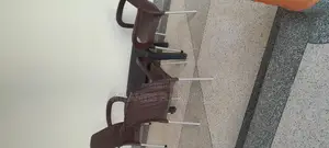 A Plastic Table (Very Nice)With Three Chairs.