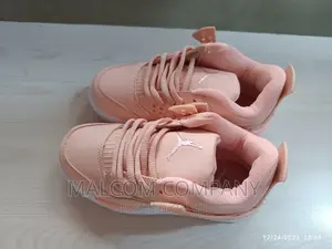 Pink Jordan 4 Girl's Sneakers
