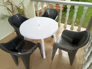 4pieces of Plastic Sofa Chairs With It's Round Table