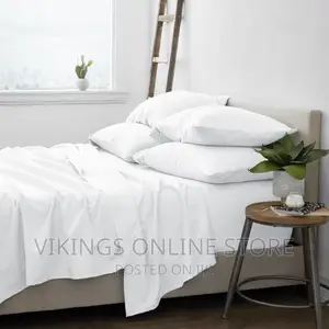 Apair of High Quality Bedsheets and 4pillowcases -White