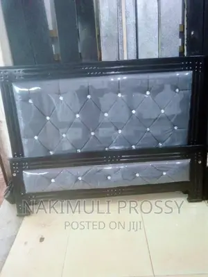 Gray Leather 5x6 Bed Available