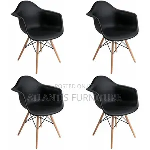 Big Black Plastic Chair With Wooden Legs.