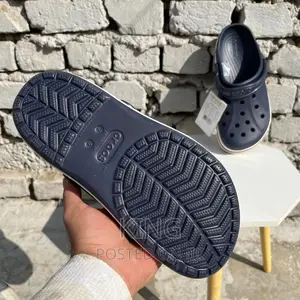 Crocs. Grey White