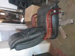 A Highend Executive Leather Office Chair With Wooden Legs
