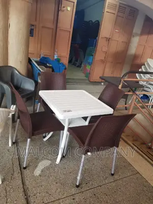 A Set of Restaurant Chairs With a Table