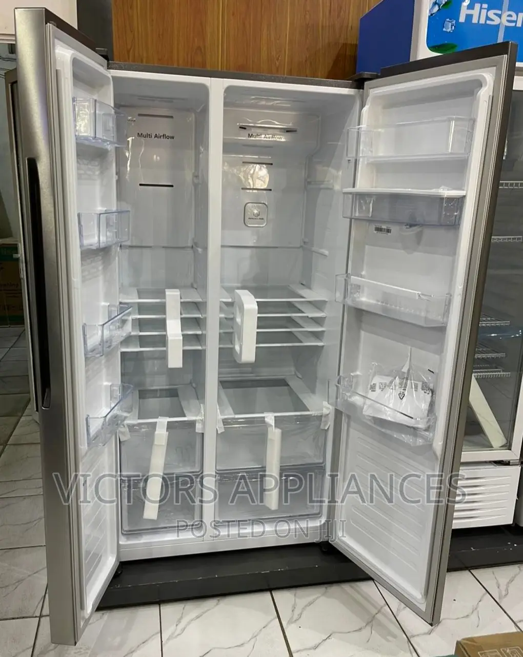 Hisense 670liters Side by Side Refrigerator Silver
