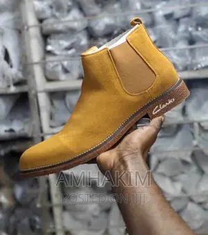 Classic Clarks Suede Boots in Stock
