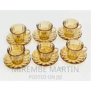 Pieces of Glass Tea Cups and Saucers Sets