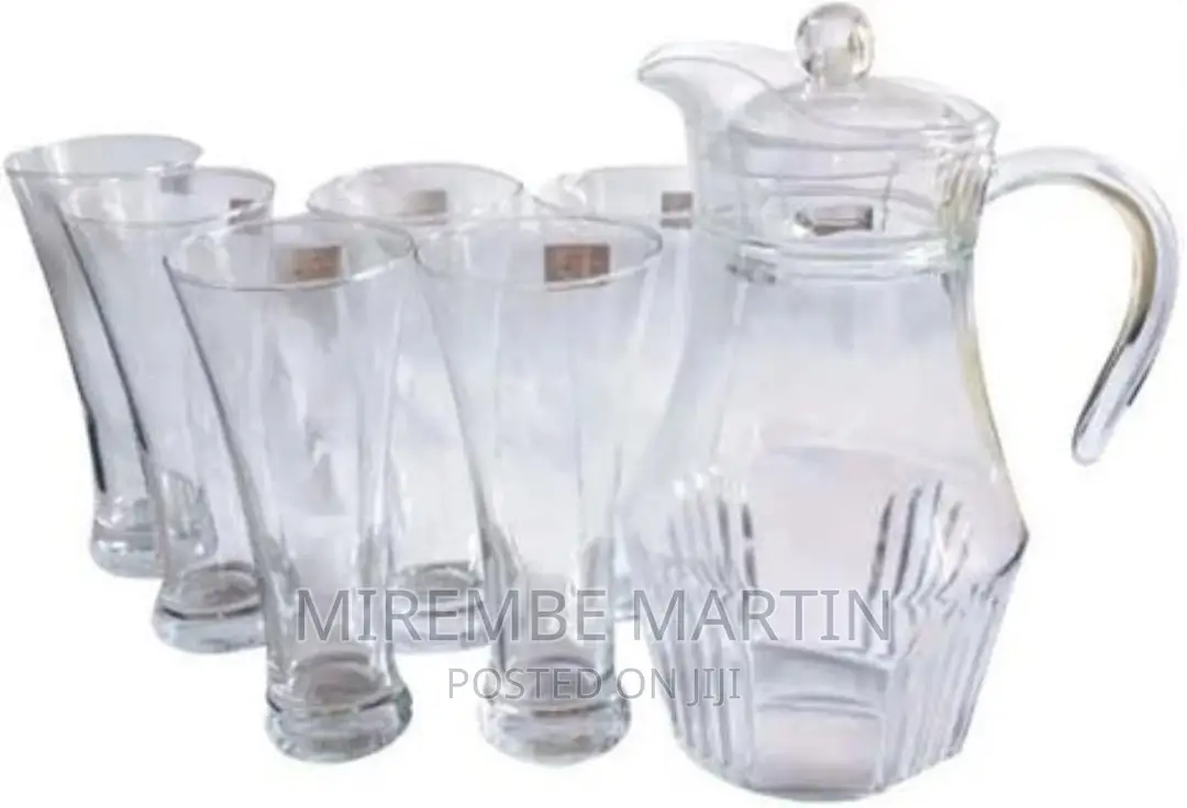 6 Drinking Glasses With a Funnel Shape Plus 1 Glass Jug
