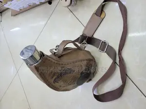 Stainless Steel Whiskey Bottle With Its Leather Bag
