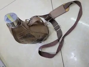 Stainless Steel Whiskey Bottle With Its Leather Bag