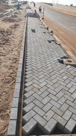 We Lay Pavers in Walkways Highways and Compounds
