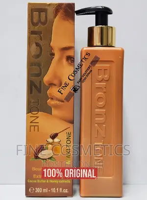 BRONZ TONE Cocoa Butter and Honey Maxitone Fade Milk Lotion.