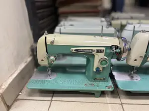 Janome Straight Sewing Machine With the Stand