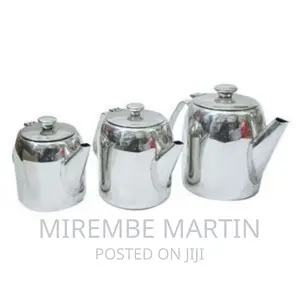 A Set of 3 Steel Tea Pots – Silver