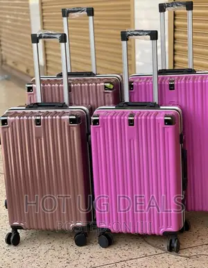 Plastic Water Proof Suitcases 4 Wheels - Multicolor