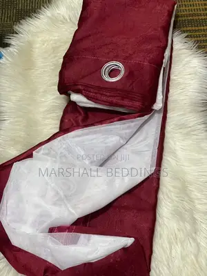 Maroon Curtains With a Net
