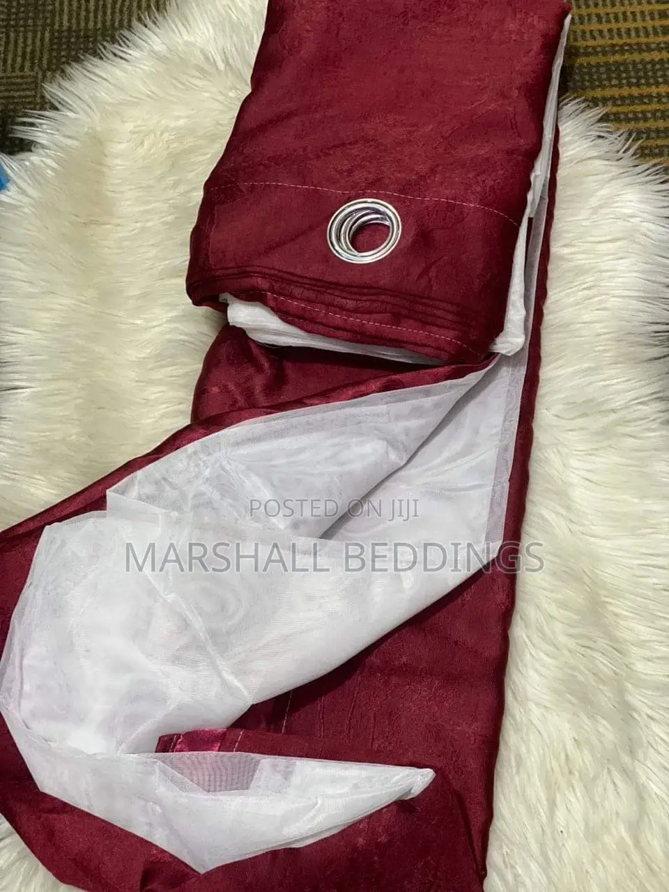 Maroon Curtains With a Net