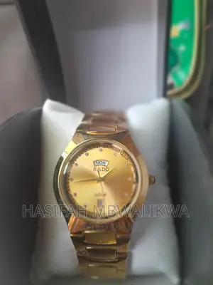 Golden Rado Watch With a Gift Box