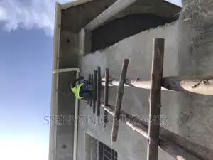 Laying of Water Gutters on Flat House