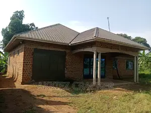 Land With a Residential Building for Sale