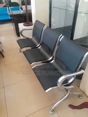 Black Cushioned Waiting Chair.