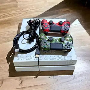 Ps4 Standard With 2 Controllers and 10 Top Games