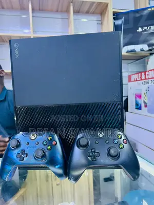 Xbox One With Pads and Games