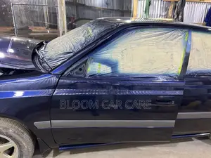 Spraying (Panel Beating)