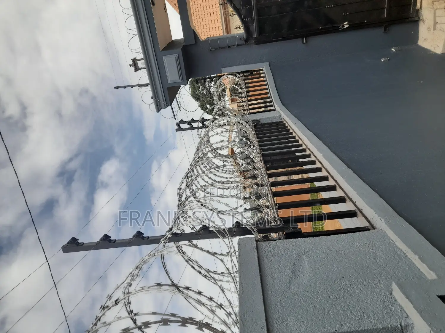 Electric Fence System With Razor Wire, Uganda