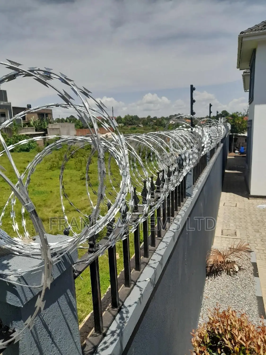 Electric Fence System With Razor Wire, Uganda