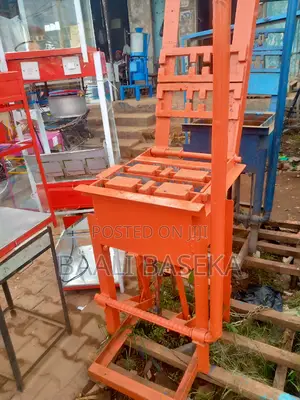 Concrete Block Machine/Orange Coloured Block Machine/Hollow
