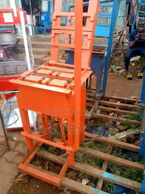Concrete Block Machine/Orange Coloured Block Machine/Hollow