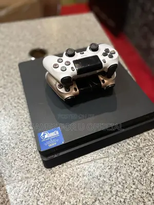 Ps4 Slim Unchipped Uk Used With Two Game Pada at 8
