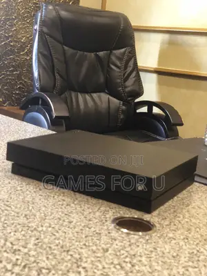 Xbox One With One Game on Its Storage Without Controllers