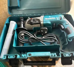 Makita Drill With Its Accessories