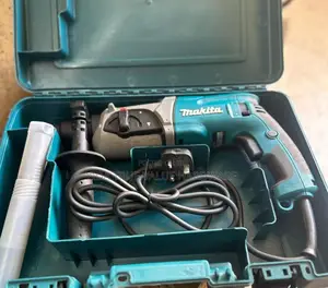Makita Drill With Its Accessories