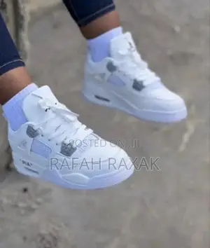 Ladies Classic White Air Jordan 4 Sneaker