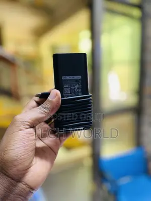 Dell Type-C Laptop Charger. (X)