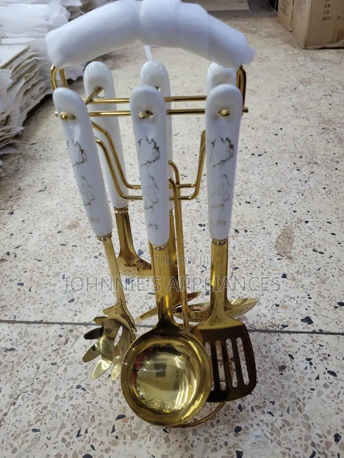 Gold And White Ceramic Serving Spoons On Are Set