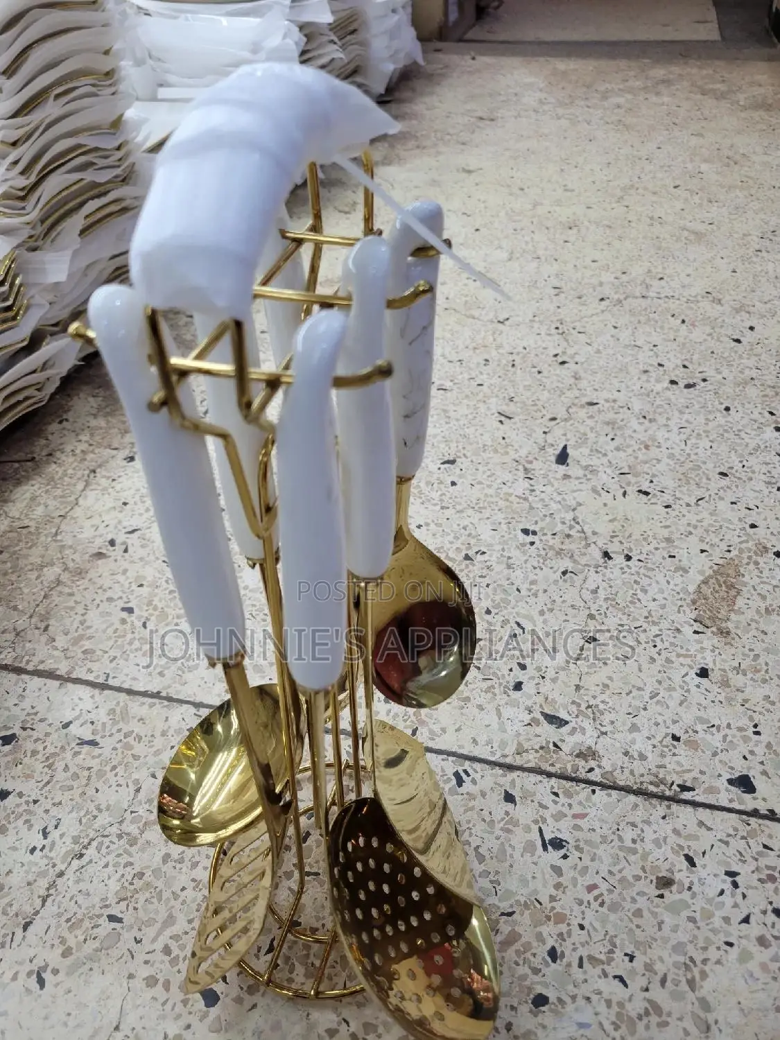 Gold And White Ceramic Serving Spoons On Are Set